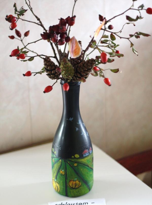 Bottle vase with autumn ikebana