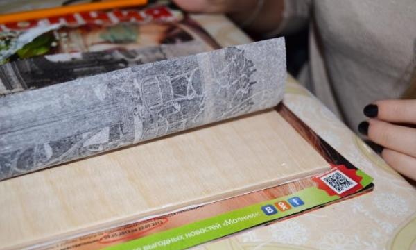 applying decoupage napkin