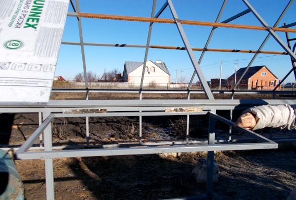 Greenhouse with a homemade frame