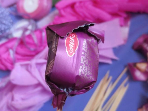 Basket with flowers made from candies