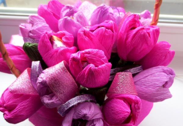 Basket with flowers made from candies