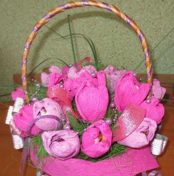 Basket with flowers made from candies