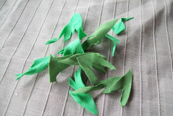 cut out leaves from green suede