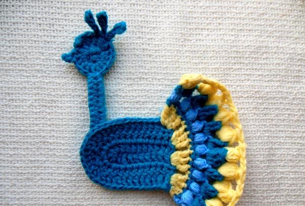 Crochet peacock applique