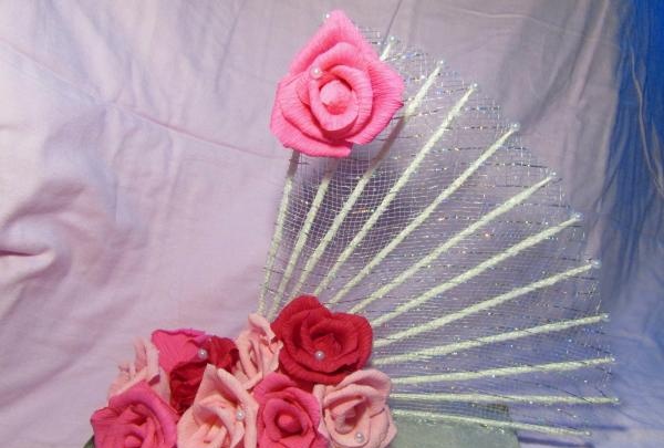 fans with roses made of corrugated paper