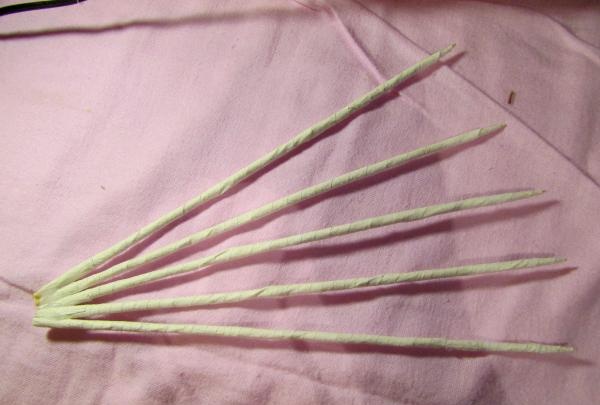 fans with roses made of corrugated paper