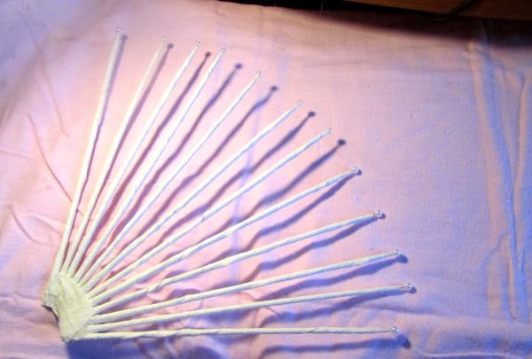 fans with roses made of corrugated paper