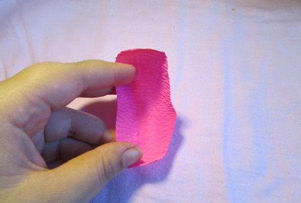 fans with roses made of corrugated paper