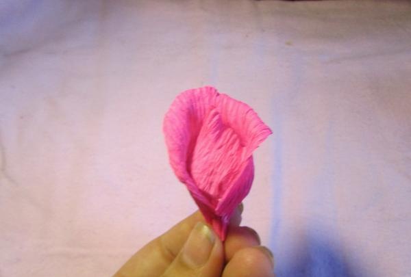 fans with roses made of corrugated paper