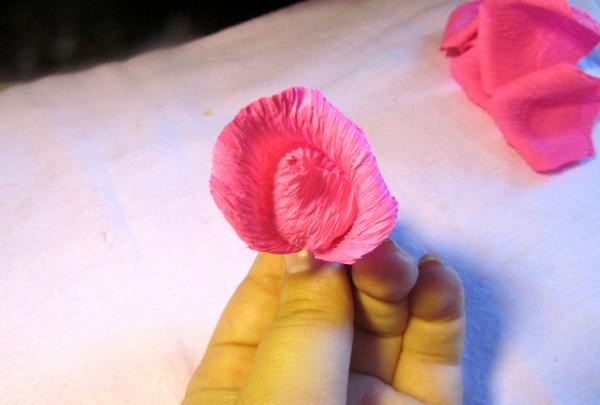 fans with roses made of corrugated paper