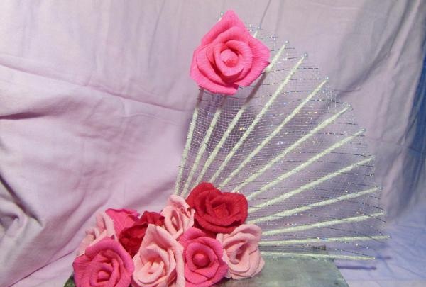 fans with roses made of corrugated paper