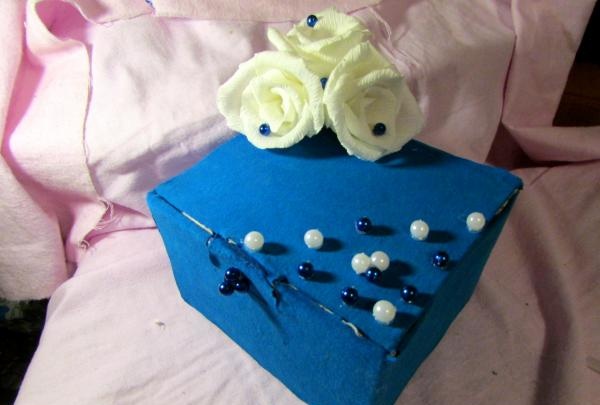 box with paper flowers