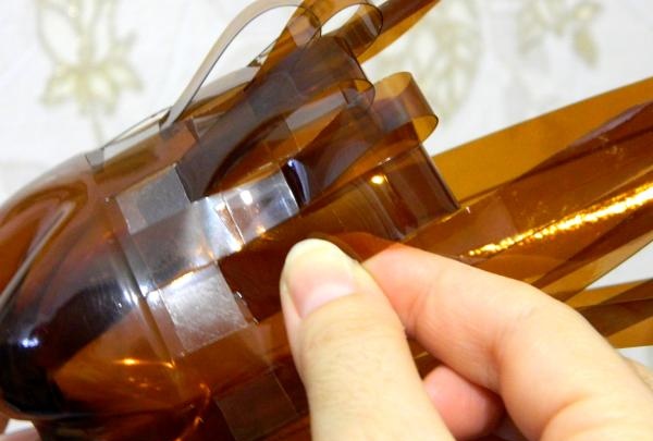 Wicker candy bowl from a bottle