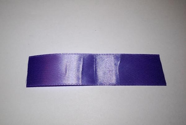 Lush purple satin ribbon bow