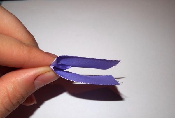 Lush purple satin ribbon bow