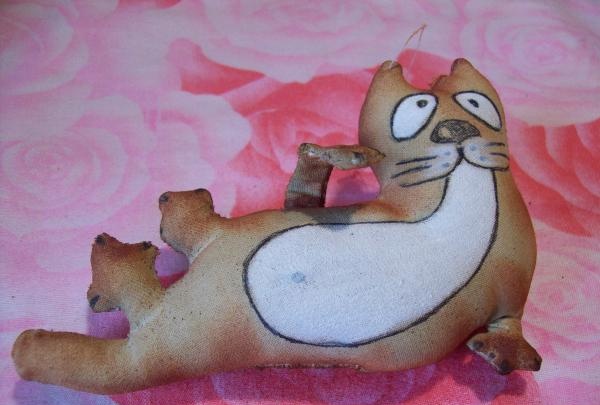 coffee toy cat fisherman