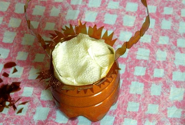 Basket with a bouquet of plastic bottles