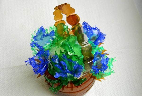 Basket with a bouquet of plastic bottles