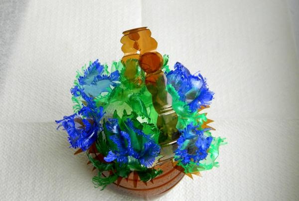 Basket with a bouquet of plastic bottles