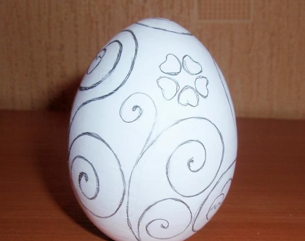 Painting a wooden egg