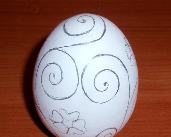 Painting a wooden egg