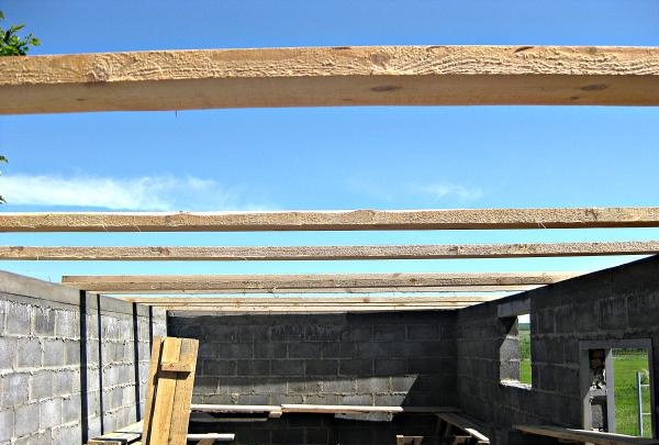 Stages of building a barn