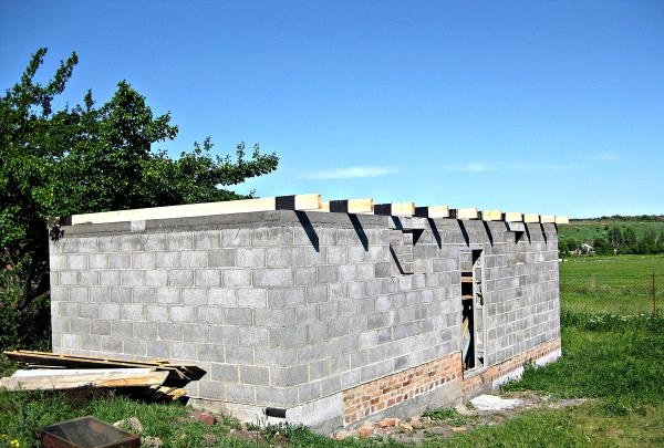 Stages of building a barn