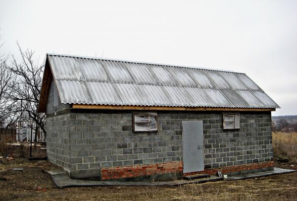 Stages of building a barn