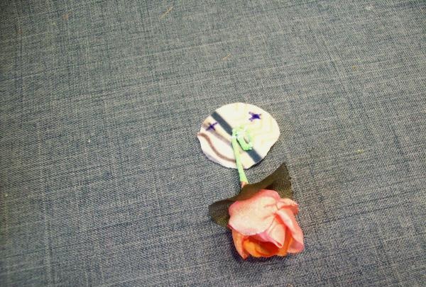 brooch with a headband with silk flowers