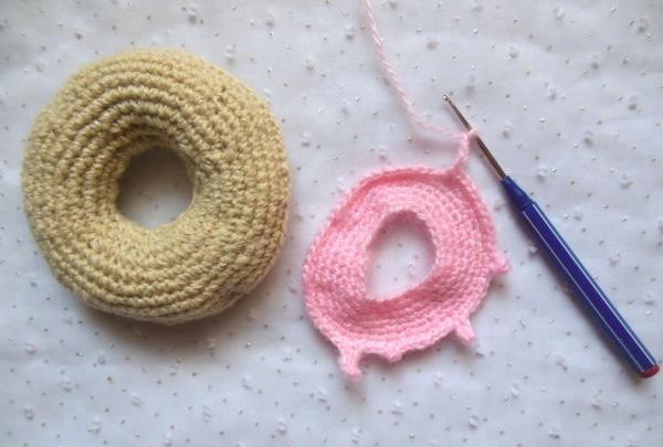 Crochet pincushion in the shape of a donut