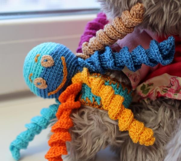 Crochet octopus hand toy