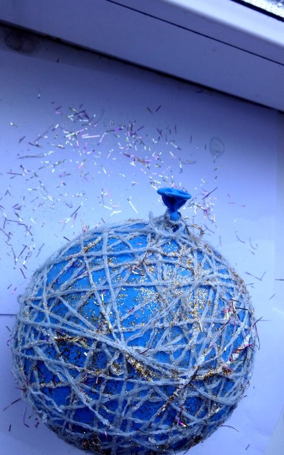 New Year's ball made of threads