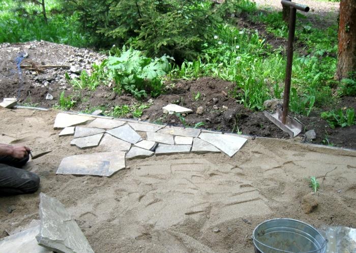 Laying the site with sandstone