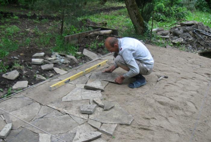 Laying the site with sandstone