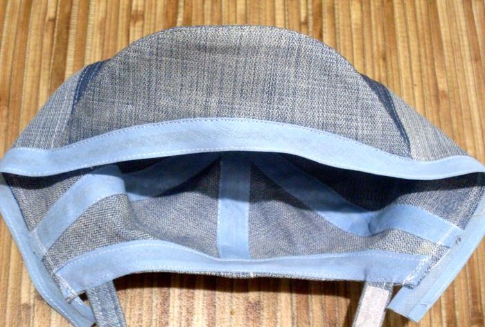 We sew a denim baseball cap for a baby