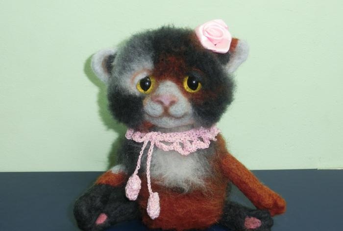 spotted cat made of wool felting