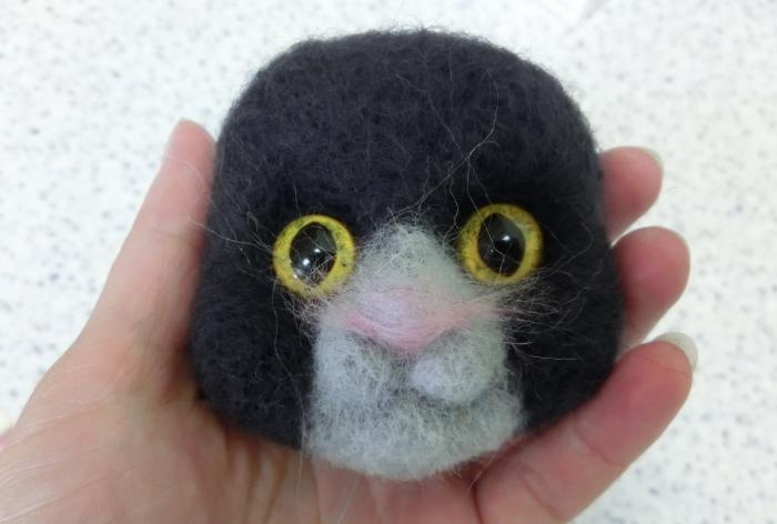 spotted cat made of wool felting