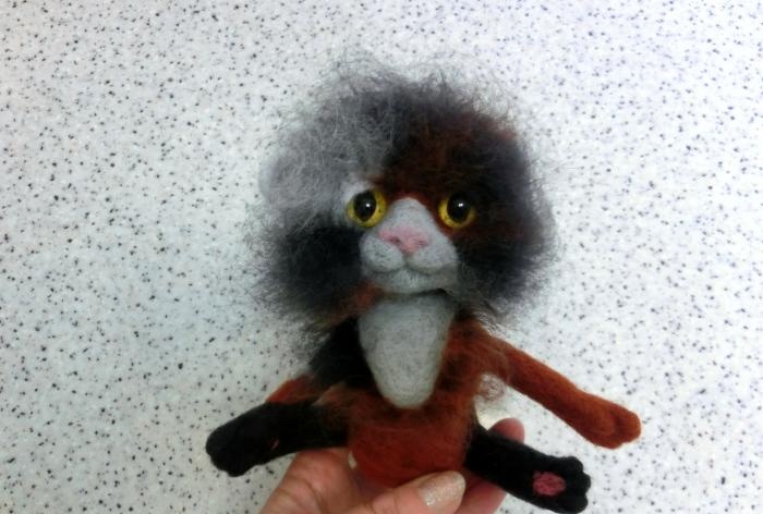 spotted cat made of wool felting