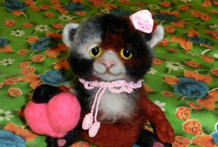 spotted cat made of wool felting