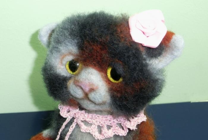 spotted cat made of wool felting