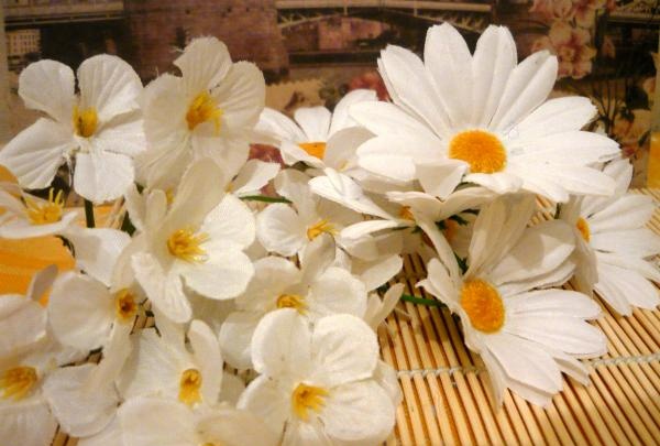 composition of colored salt and flowers