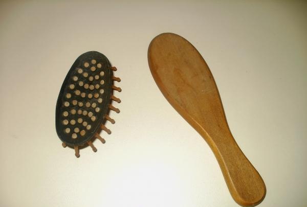 Separate the brush from the wooden body