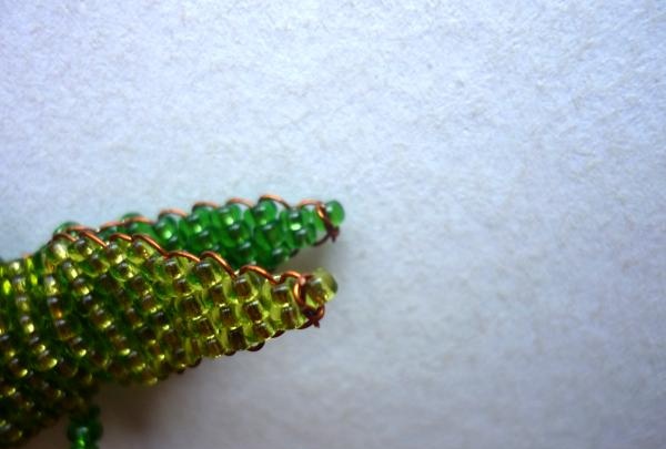 tisser des perles de crocodile