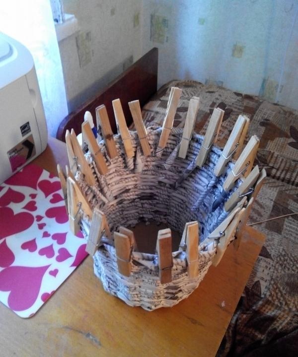 Flower pot made from newspaper tubes