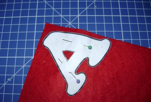 Place letters on felt