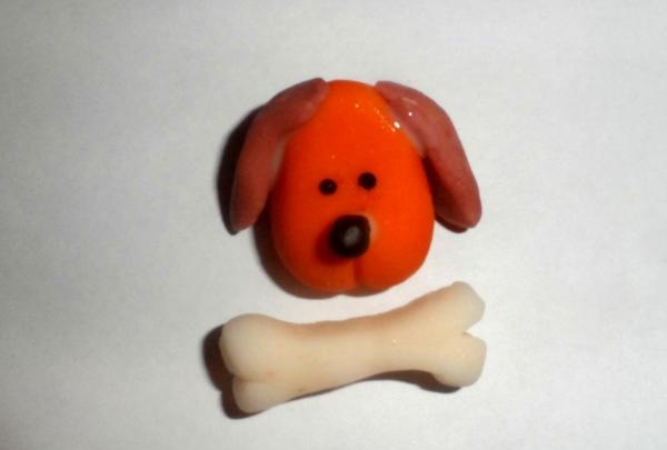 Dog magnet made of cold porcelain