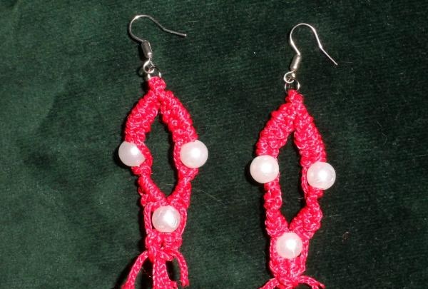 Earrings made using macrame technique