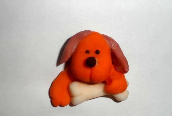 Dog magnet made of cold porcelain