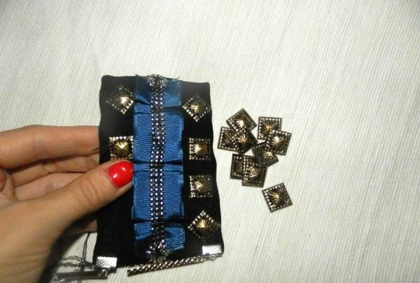 sew metal elements to shoulder straps