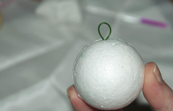 stick it into a foam ball